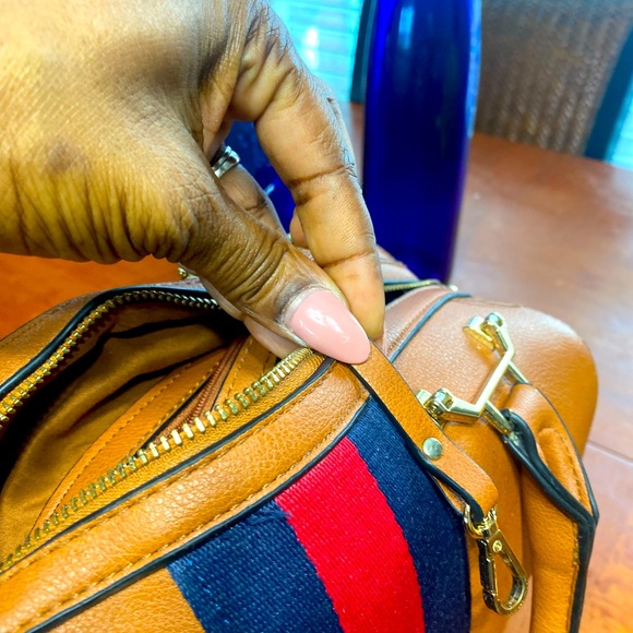 No name tan cute duffle style purse. With black and red stripe. - Picture 3 of 4